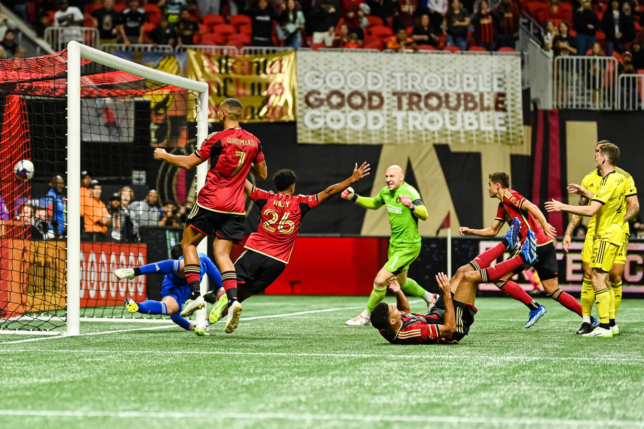 Players react after the goal by Atlanta United defender Miles Robinson #12 during the second half of the match against Columbus Crew at Mercedes-Benz Stadium in Atlanta, GA on Saturday, October 7, 2023. (Photo by Mitch Martin/Atlanta United)