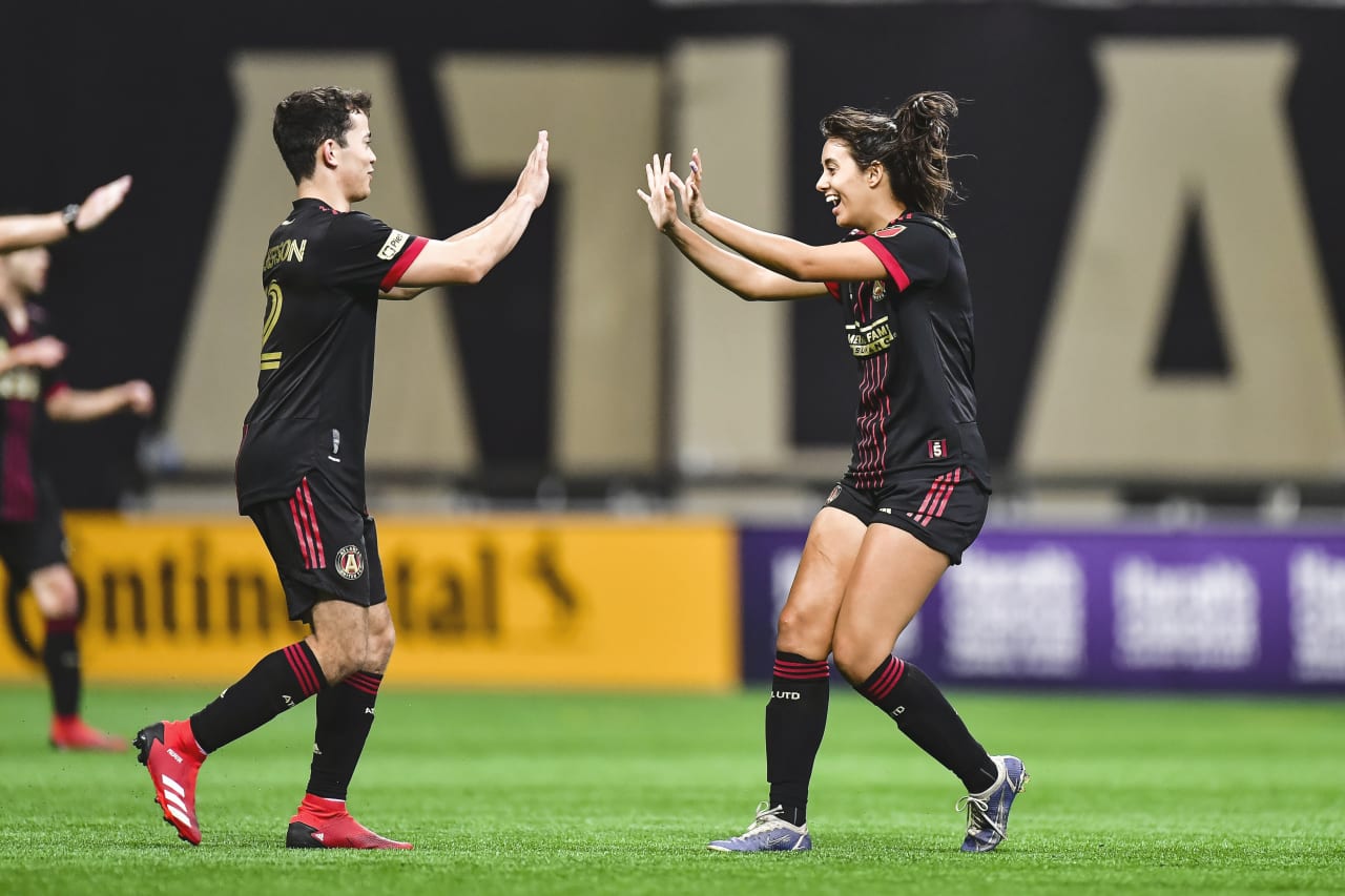 Players celebrate after a goal is scored during the Unified match against Orlando City SC at Mercedes-Benz Stadium in Atlanta, Georgia, on Sunday July 17, 2022. (Photo by Kyle Hess/Atlanta United)