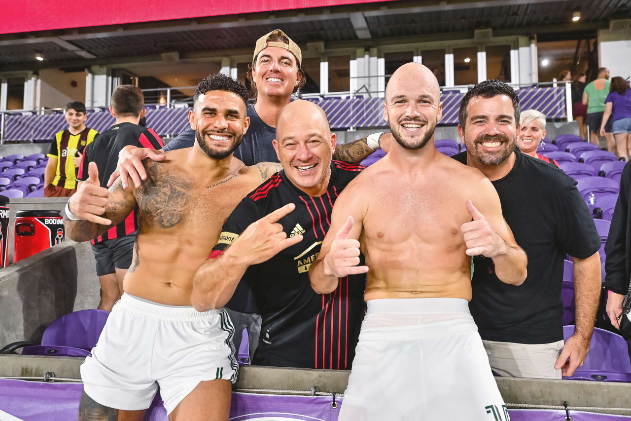 Atlanta United forward Dom Dwyer #4 and defender Andrew Gutman #15 pose for a photo with supporters after the match the match against Orlando City at Exploria Stadium in Orlando, United States on Wednesday September 14, 2022. (Photo by Dakota Williams/Atlanta United)