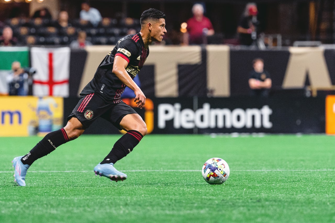 Atlanta United defender Ronald Hernandez #2 dribbles the ball during the match against CF Montreal at Mercedes-Benz Stadium in Atlanta, United States on Saturday March 19, 2022. (Photo by Dakota Williams/Atlanta United)