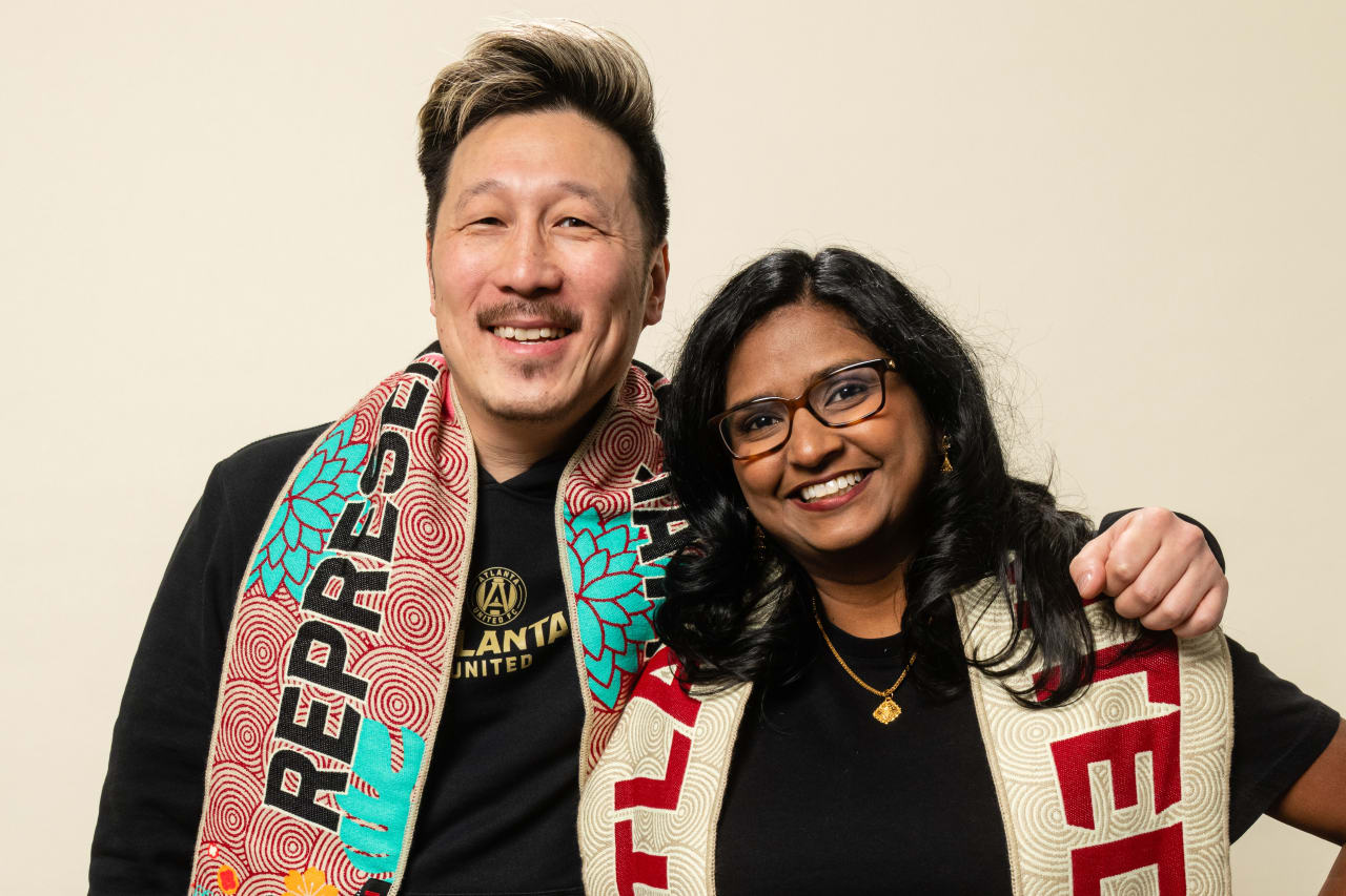Atlanta United staff members model May Scarf of the Month on Tuesday, April 25, 2023.