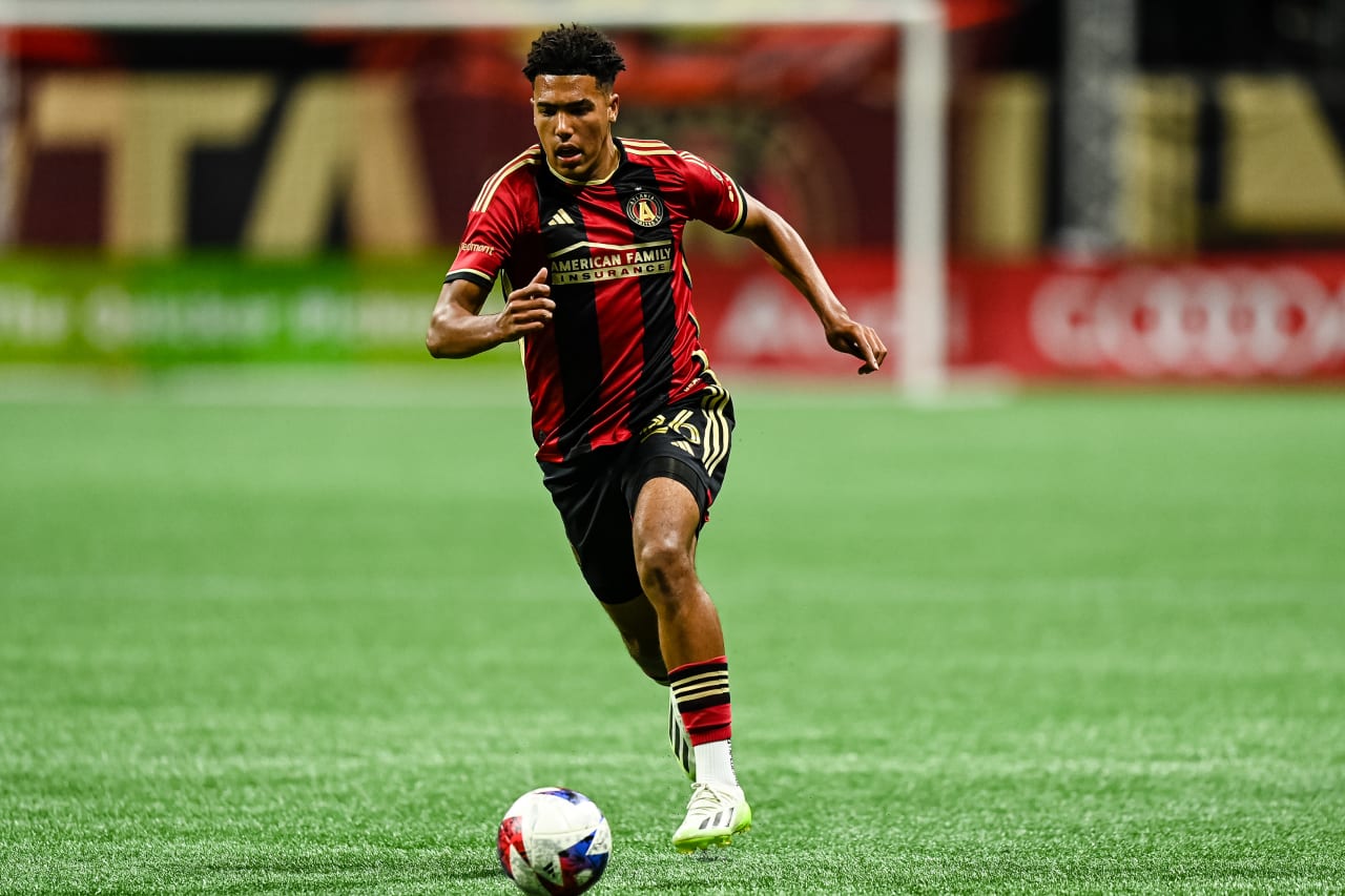 Atlanta United defender Caleb Wiley #26 dribbles during the first half of the match against Columbus Crew at Mercedes-Benz Stadium in Atlanta, GA on Saturday, October 7, 2023. (Photo by Mitch Martin/Atlanta United)