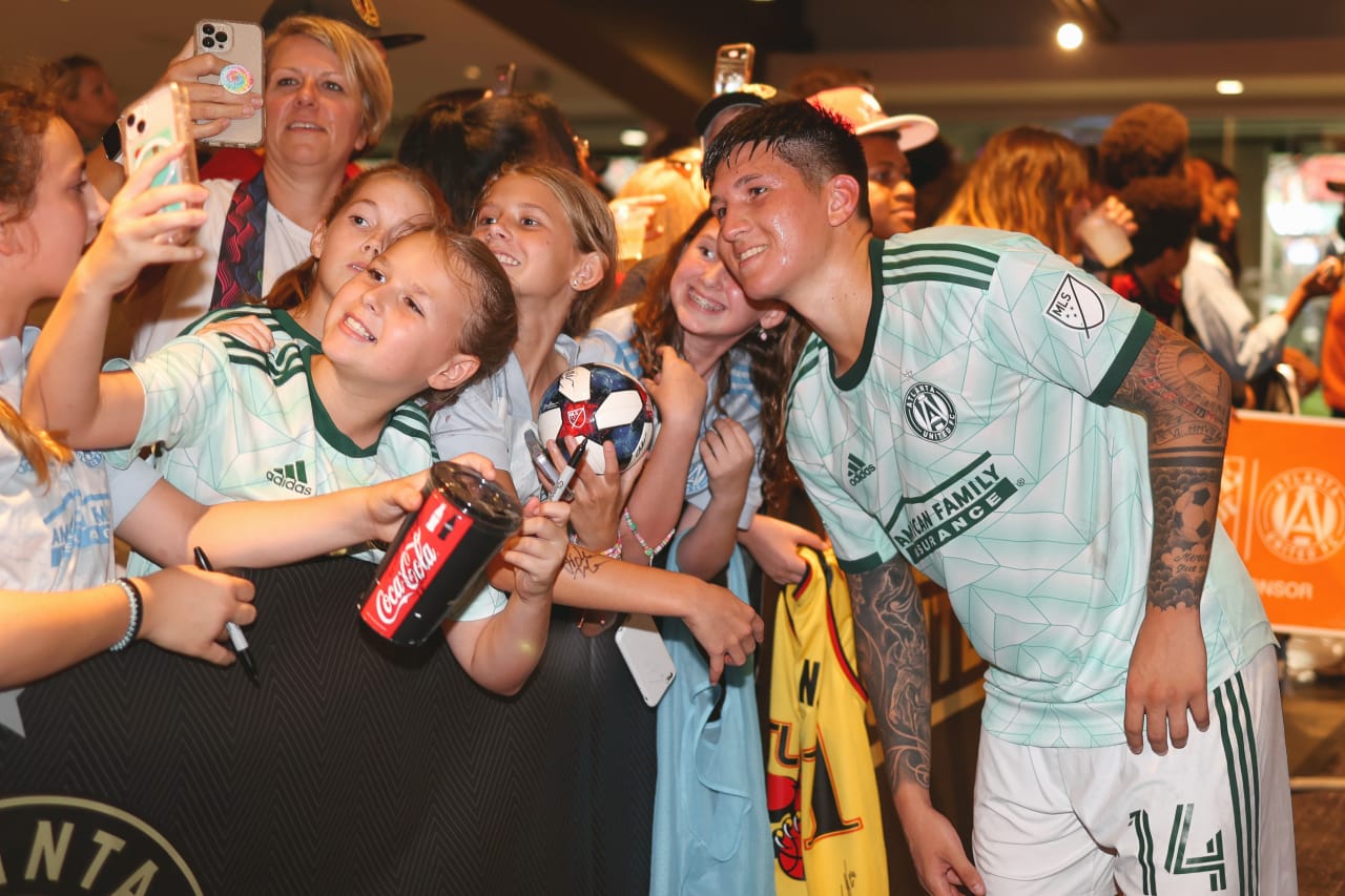 Atlanta United midfielder Franco Ibarra #14 greets fans after the match against Seattle Sounders FC at Mercedes-Benz Stadium in Atlanta, United States on Saturday August 6, 2022. (Photo by Chamberlain Smith/Atlanta United)