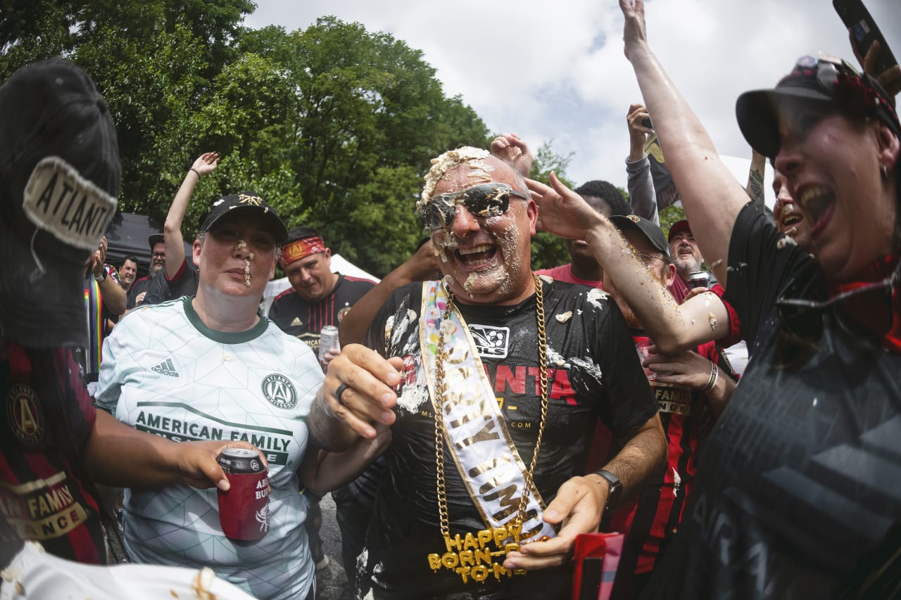 Team president Darren Eales celebrates his birthday and final match with supporters prior to the match against Seattle Sounders FC at Mercedes-Benz Stadium in Atlanta, United States on Saturday August 6, 2022. (Photo by Mitchell Martin/Atlanta United)