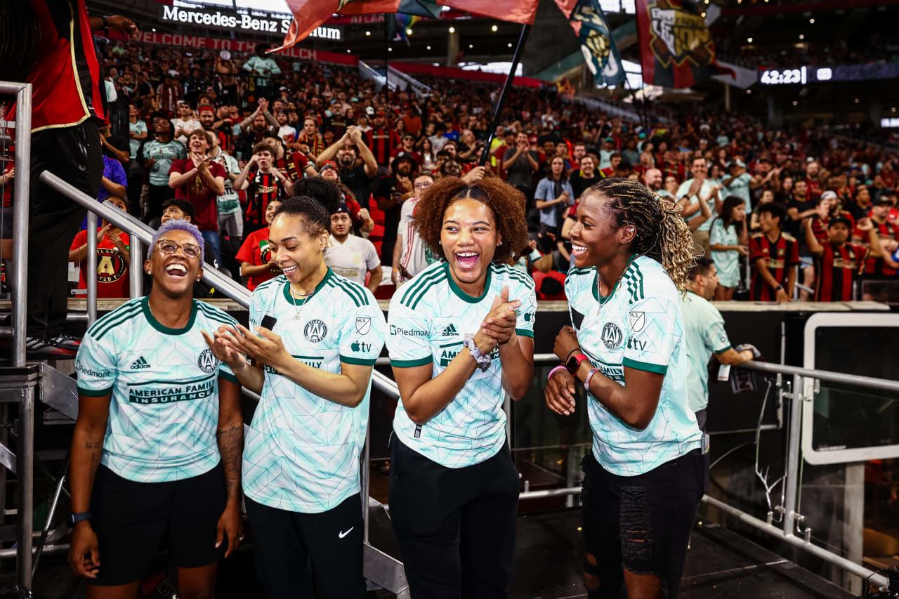 Atlanta Dream players clap with supporters during the match against New York City FC at Mercedes-Benz Stadium in Atlanta, GA on Wednesday, June 21, 2023. (Photo by Bee Trofort-Wilson/Atlanta United)