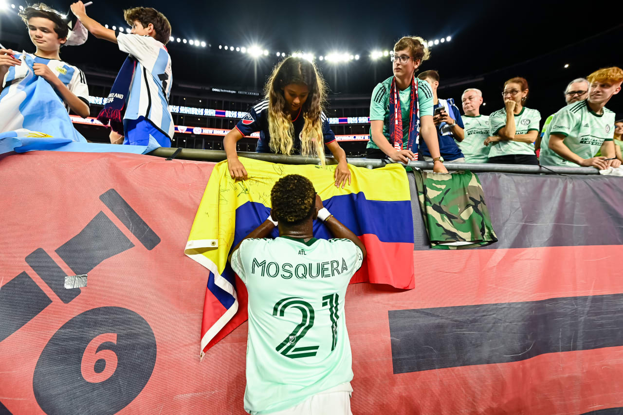 Atlanta United forward Edwin Mosquera #21 greets a supporter after the match against New England Revolution at Gillette Stadium in Foxborough, MA on Wednesday, July 12, 2023. (Photo by Jay Bendlin/Atlanta United)
