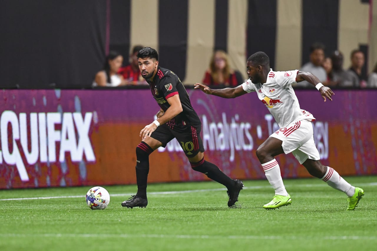 Atlanta United midfielder Marcelino Moreno #10 dribbles the ball during during the match against New York Red Bulls at Mercedes-Benz Stadium in Atlanta, United States on Wednesday August 17, 2022. (Photo by Kyle Hess/Atlanta United)