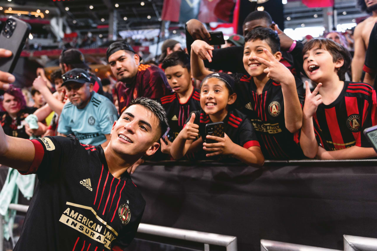Atlanta United midfielder Thiago Almada #8 poses for a selfie with supporters after the match against CF Montreal at Mercedes-Benz Stadium in Atlanta, United States on Saturday March 19, 2022. (Photo by Mitchell Martin/Atlanta United)