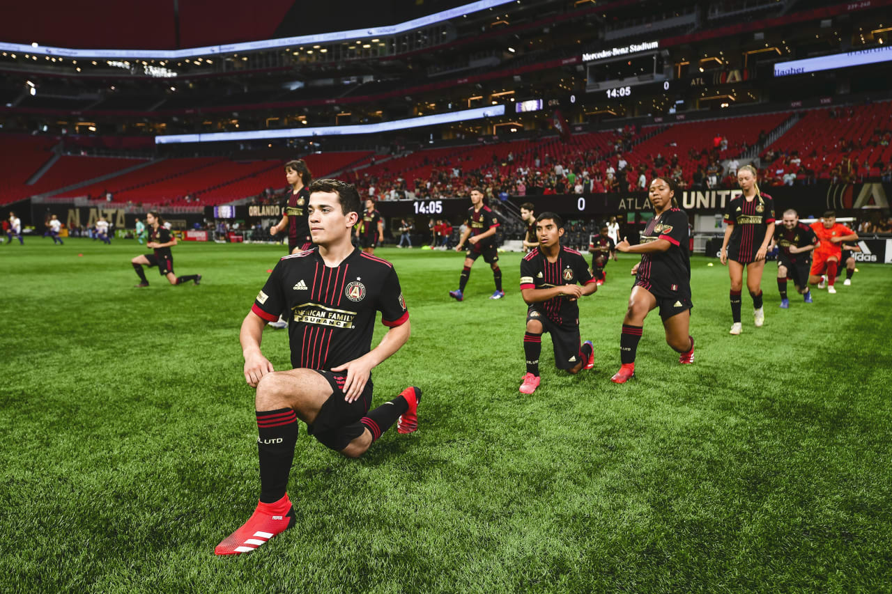 Players warm up before the Unified match against Orlando City SC at Mercedes-Benz Stadium in Atlanta, Georgia, on Sunday July 17, 2022. (Photo by Kyle Hess/Atlanta United)