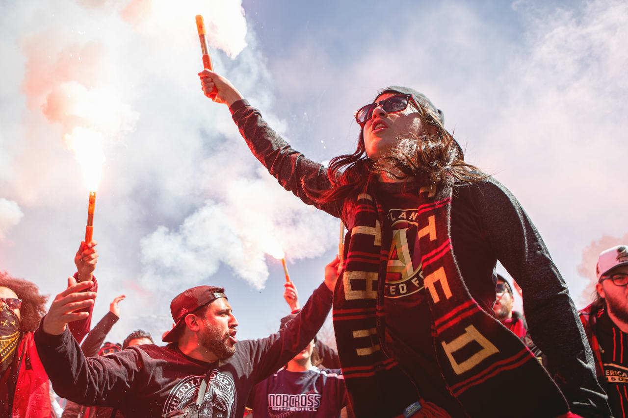 Atlanta United supporters march before the 2022 Opening Day match against Charlotte FC at Mercedes-Benz Stadium in Atlanta, United States on Sunday March 13, 2022. (Photo by AJ Reynolds/Atlanta United)