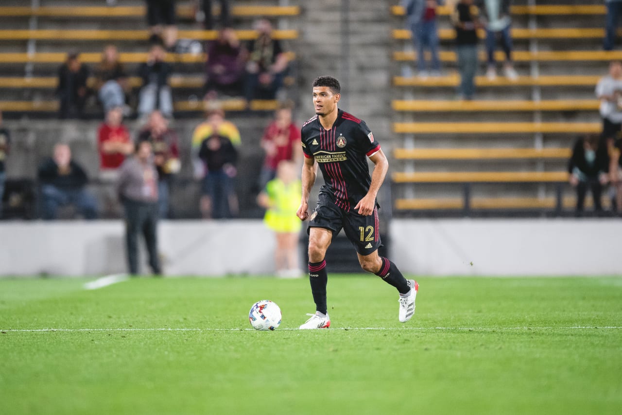 Atlanta United defender Miles Robinson #12 dribbles the ball during the match against Chattanooga FC at Fifth Third Bank Stadium in Kennesaw, United States on Wednesday April 20, 2022. (Photo by Kyle Hess/Atlanta United)