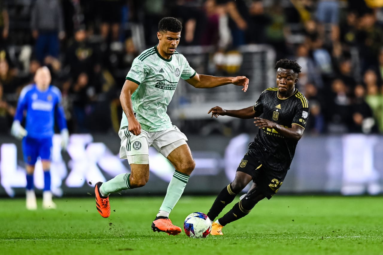 Atlanta United defender Miles Robinson #12 dribbles during the first half of the match against Los Angeles FC at BMO Stadium in Los Angeles, CA on Wednesday, June 7, 2023. (Photo by Mitchell Martin/Atlanta United)