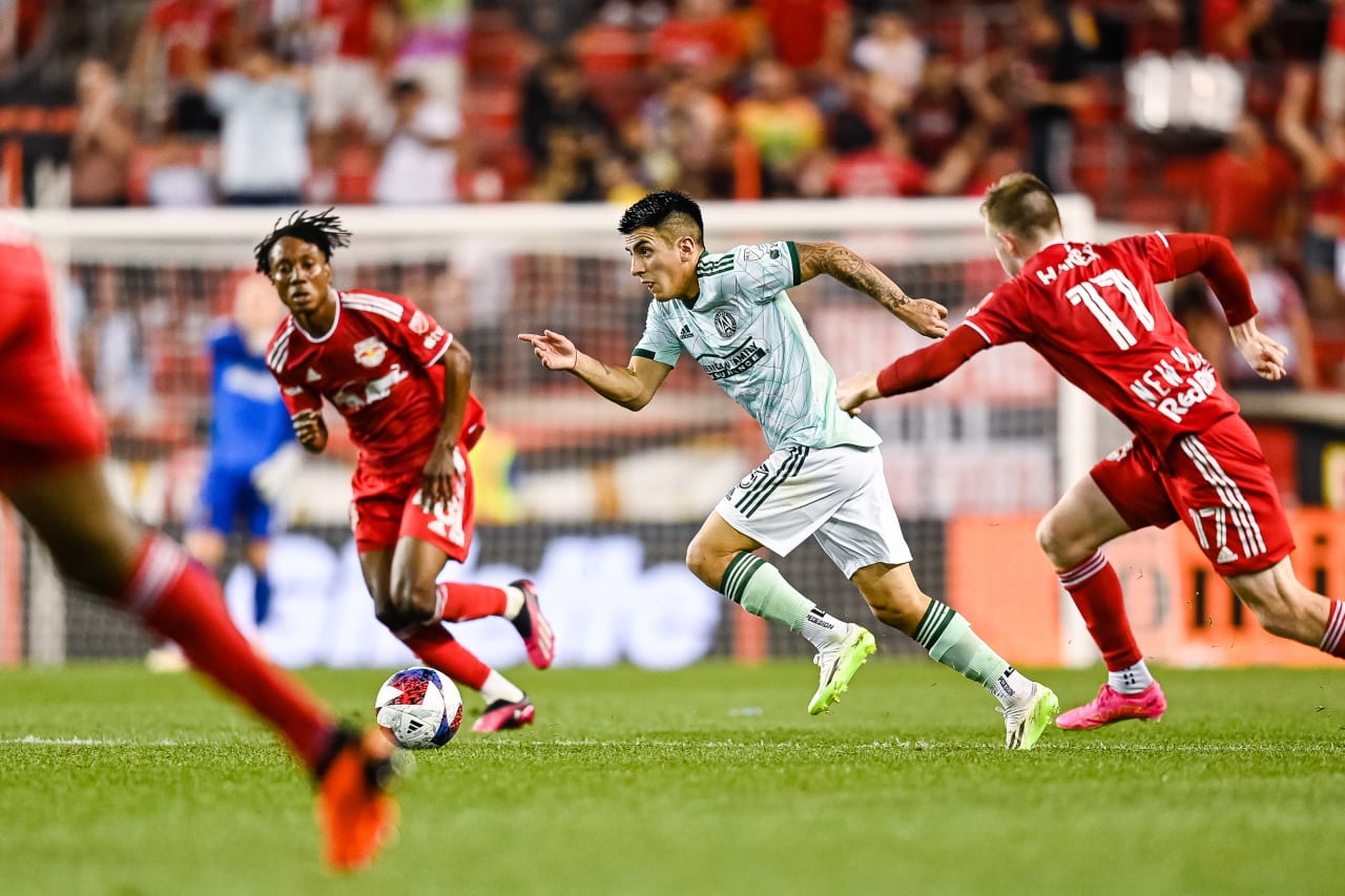 Atlanta United midfielder Thiago Almada #23 dribbles the ball during the match against New York Red Bulls at Red Bull Arena in Harrison, NJ on Saturday, June 24, 2023. (Photo by Mitchell Martin/Atlanta United)