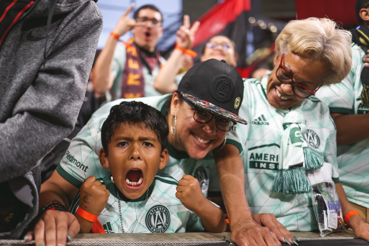 A young fan cheers during the match against Chicago Fire at Mercedes-Benz Stadium in Atlanta, Georgia, on Saturday May 7, 2022. (Photo by Chamberlain Smith/Atlanta United)
