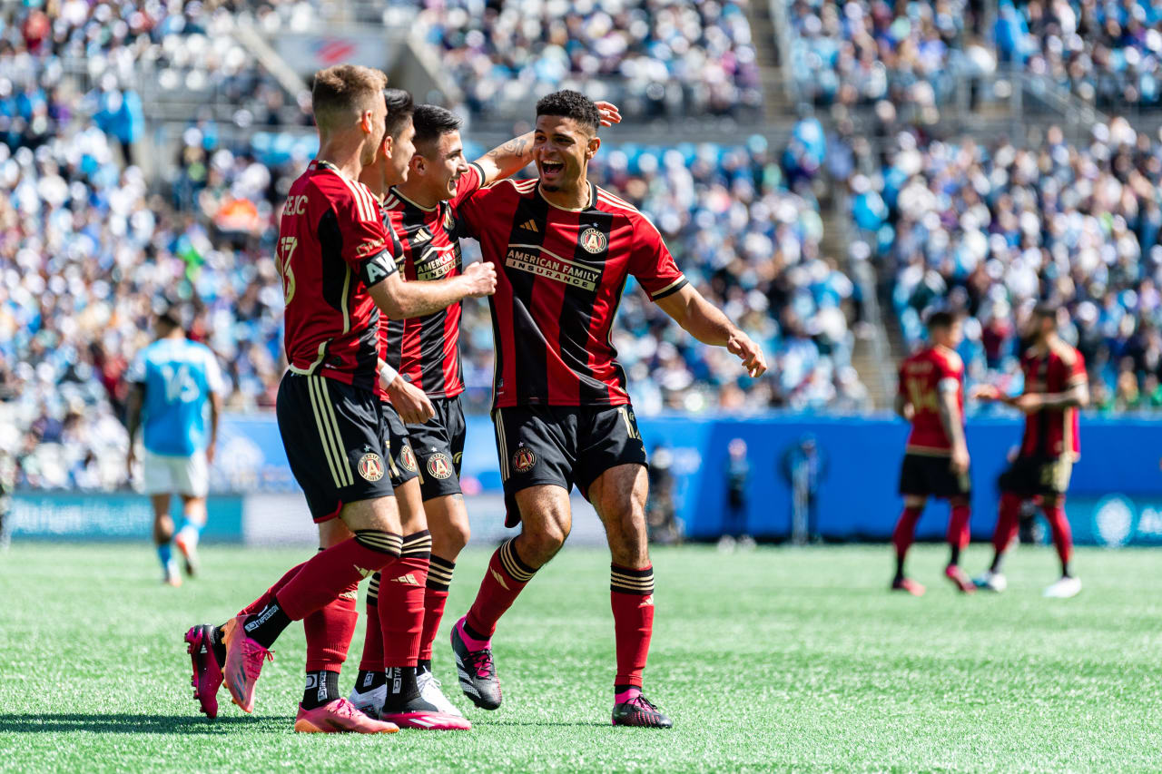 Atlanta United defender Miles Robinson #12 celebrates with his teammates after a goal during the match against Charlotte FC at Bank of America Stadium in Charlotte, North Carolina on Saturday, March11, 2023. (Photo by Mitch Martin/Atlanta United)