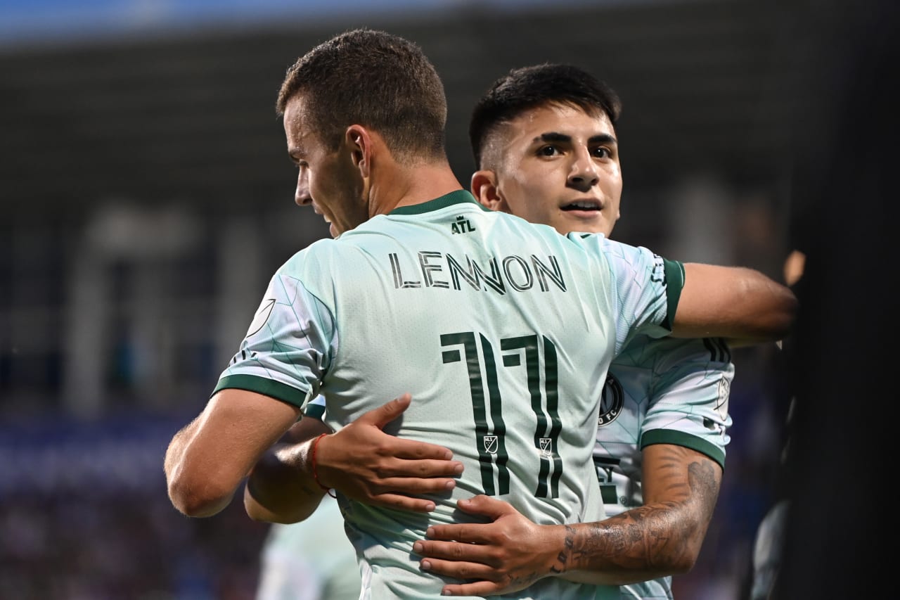 Atlanta United defender Brooks Lennon #11 celebrates with midfielder Thiago Almada #23 after scoring a goal during the match against CF Montreal at Stade Saputo in Montreal, Canada on Saturday, July 8, 2023. (Photo by Mitchell Martin/Atlanta United)