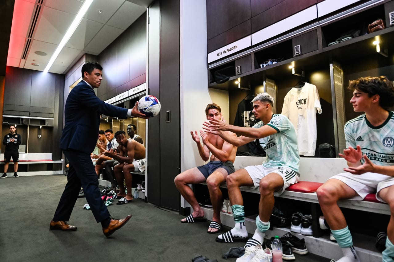 Atlanta United Head Coach Gonzalo Pineda gives Atlanta Untied midfielder Nick Firmino #51 the game ball after the match against New York City FC at Mercedes-Benz Stadium in Atlanta, GA on Wednesday, June 21, 2023. (Photo by Mitchell Martin/Atlanta United)