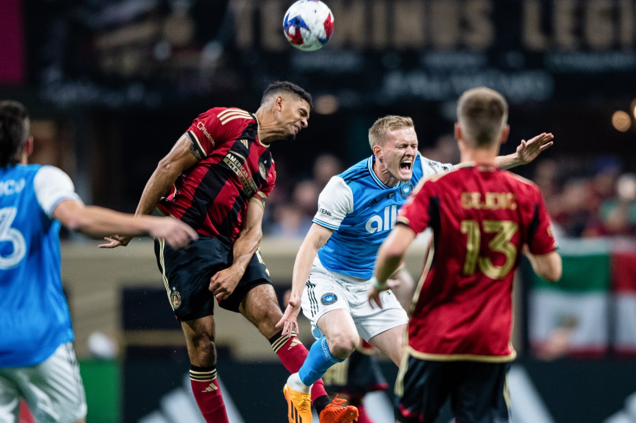 Atlanta United defender Miles Robinson #12 heads the ball during the first half of the match against Charlotte FC at Mercedes-Benz Stadium in Atlanta, GA on Saturday, May 13, 2023. (Photo by Kathryn Skeean/Atlanta United)