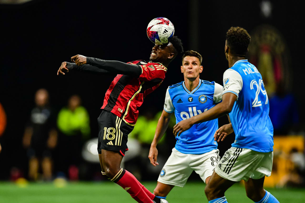 Atlanta United midfielder Derrick Etienne Jr. #18 heads the ball during the second half of the match against Charlotte FC at Mercedes-Benz Stadium in Atlanta, GA on Saturday May 13, 2023. (Photo by Kyle Hess/Atlanta United)