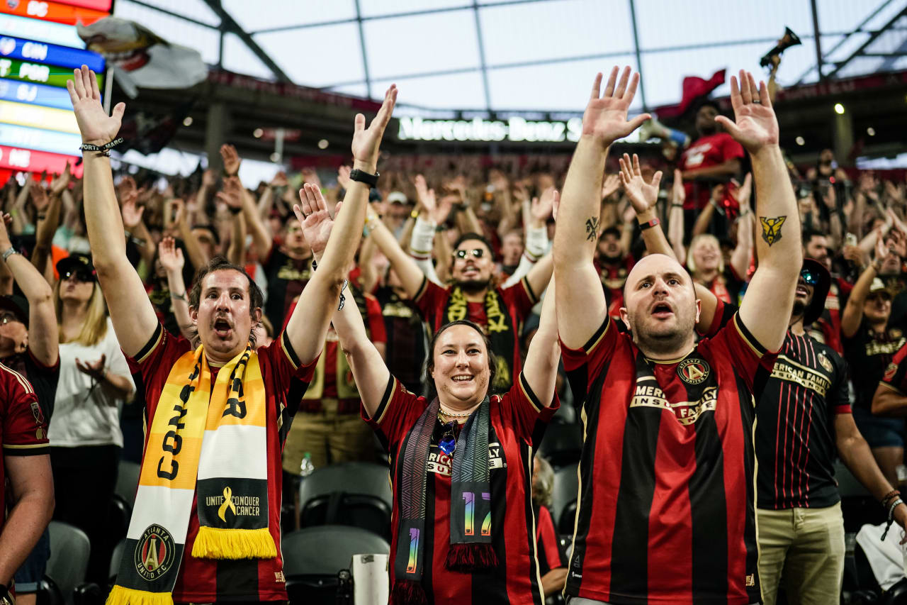 Supporters cheer during the first half of the match against Charlotte FC at Mercedes-Benz Stadium in Atlanta, GA on Saturday May 13, 2023. (Photo by Matthew Grimes/Atlanta United)