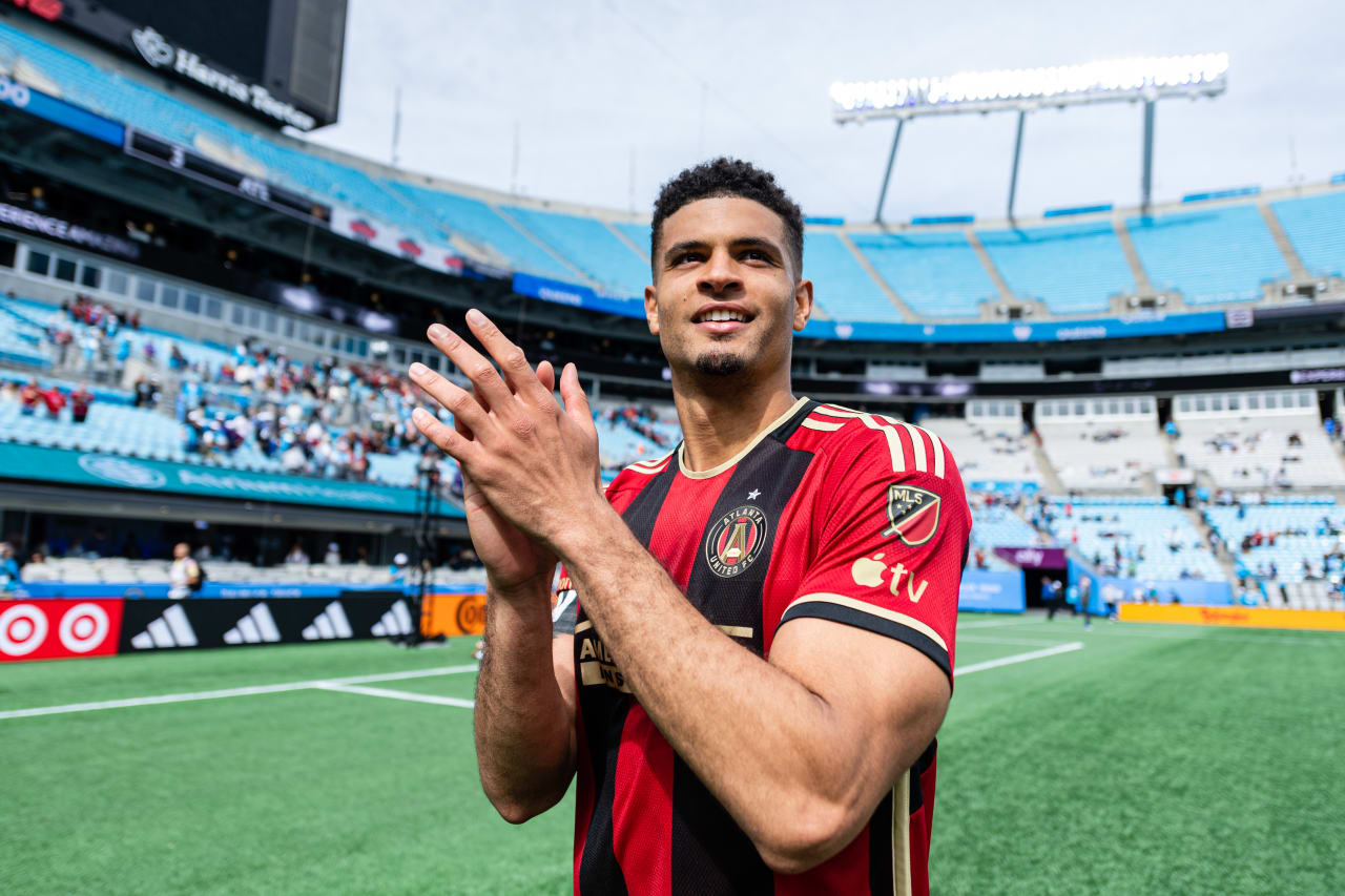 Atlanta United defender Miles Robinson #12 thanks the traveling supporters after the match against Charlotte FC at Bank of America Stadium in Charlotte, North Carolina on Saturday, March11, 2023. (Photo by Mitch Martin/Atlanta United)
