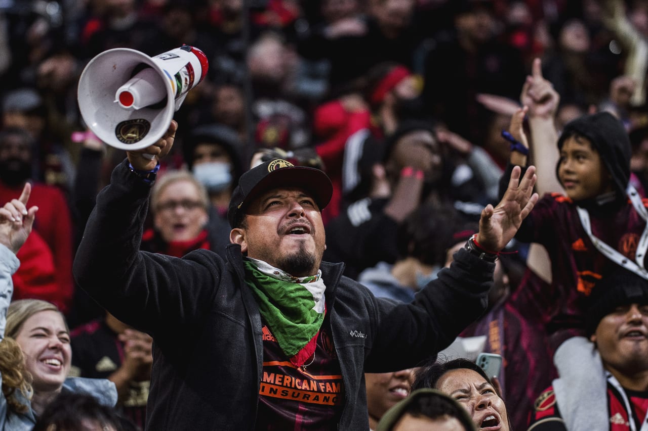Atlanta United supporters cheer during the match against Toronto FC at Mercedes-Benz Stadium in Atlanta, Georgia, on Saturday October 30, 2021. (Photo by Fred Daniels /Atlanta United)