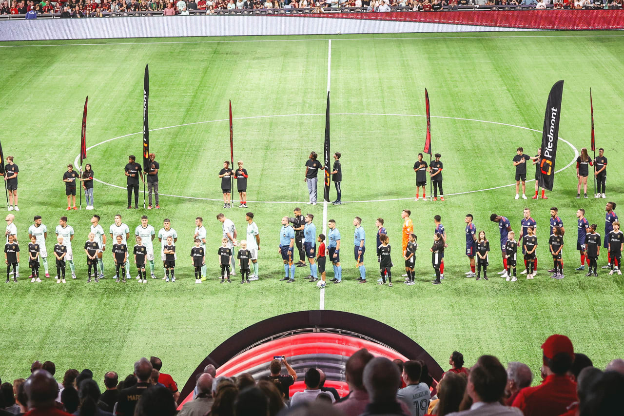Players line up for the Anthem before the match against Chicago Fire at Mercedes-Benz Stadium in Atlanta, Georgia, on Saturday May 7, 2022. (Photo by Chamberlain Smith/Atlanta United)