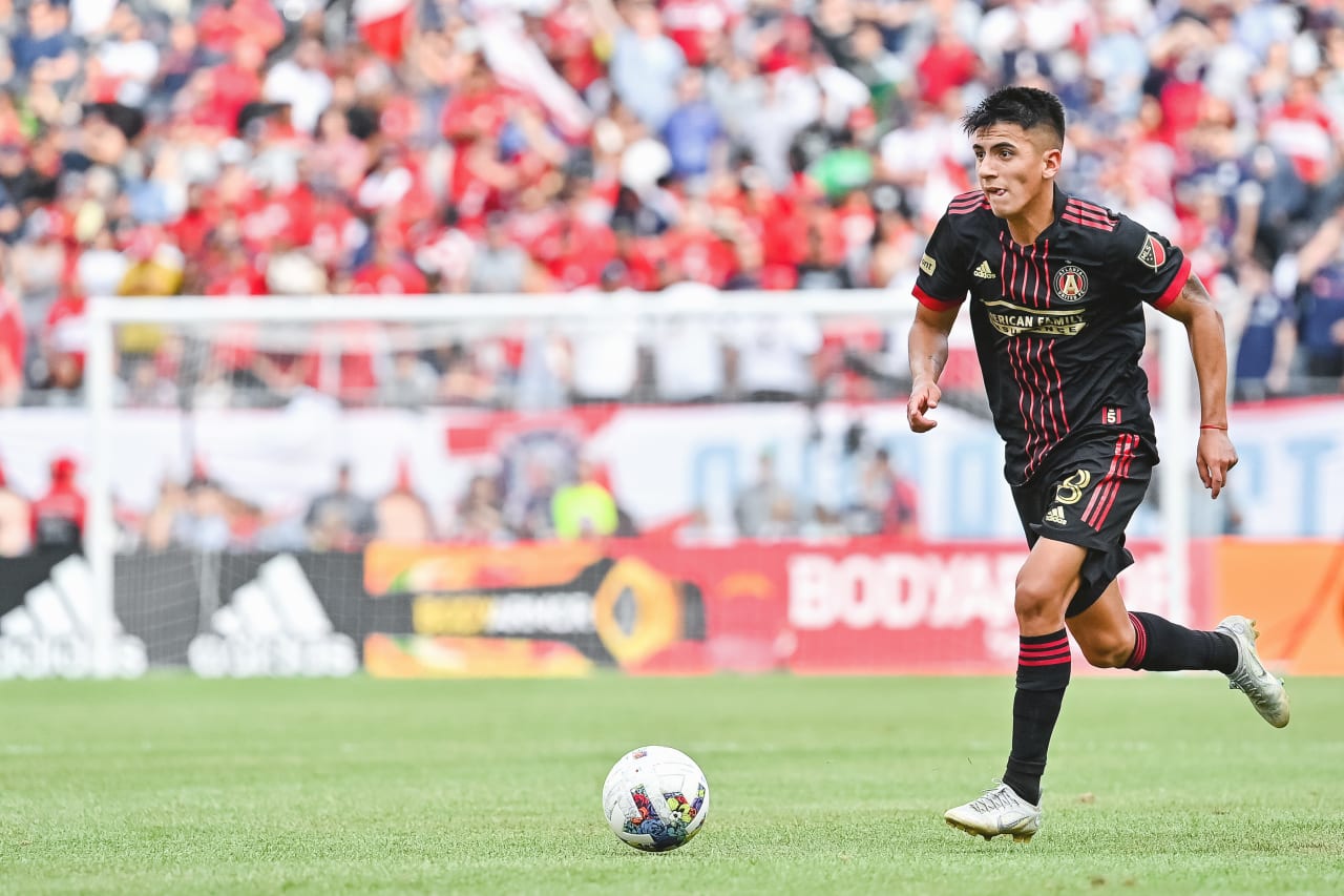 Atlanta United midfielder Thiago Almada #8 dribbles the ball during the second half of the match against Chicago Fire FC at Soldier Field in Chicago, United States on Saturday July 30, 2022. (Photo by Dakota Williams/Atlanta United)