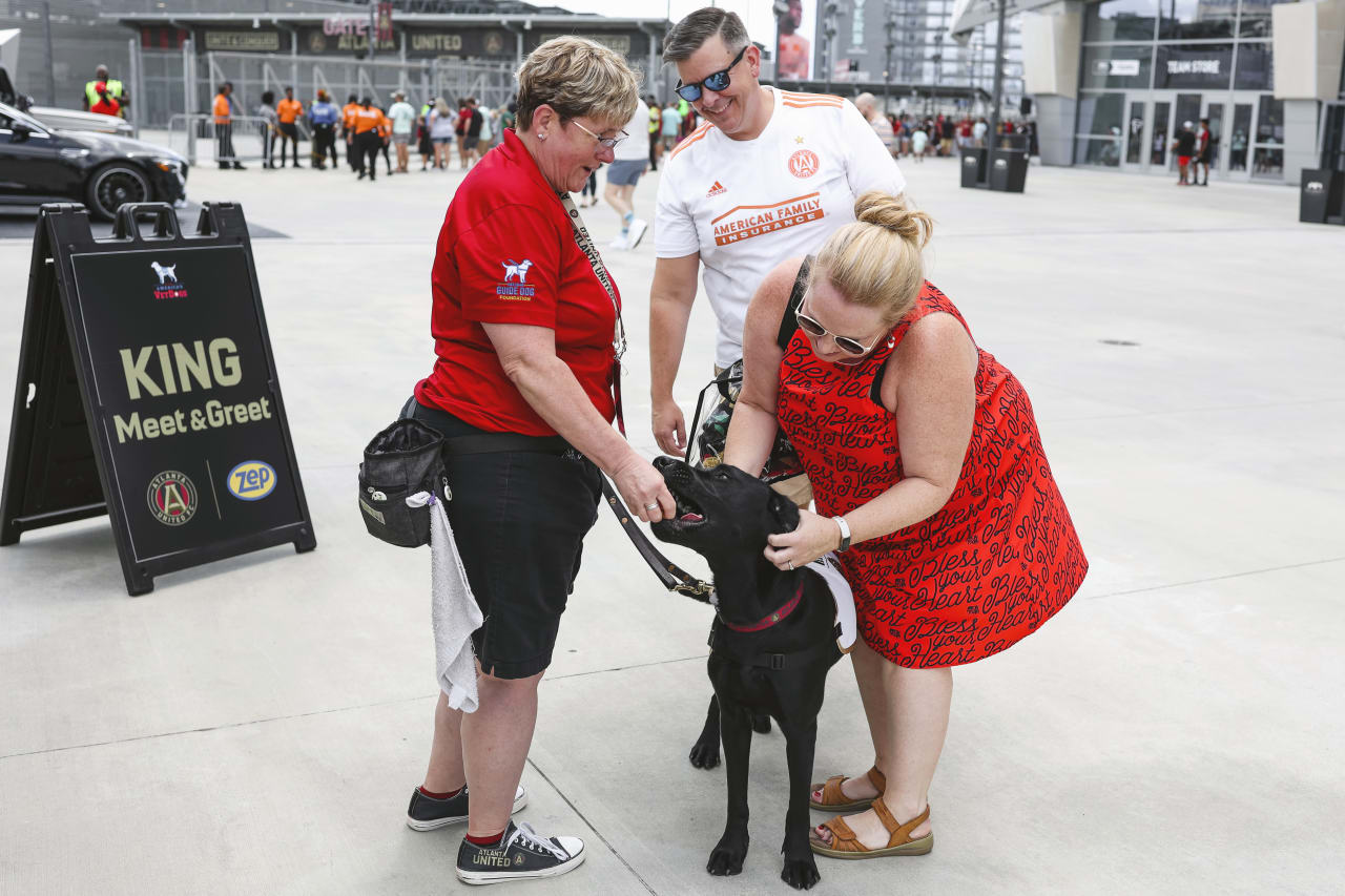 Atlanta United and America’s VetDogs dog, King before the match against D.C. United at Mercedes-Benz Stadium in Atlanta, United States on Sunday August 28, 2022. (Photo by Chamberlain Smith/Atlanta United)