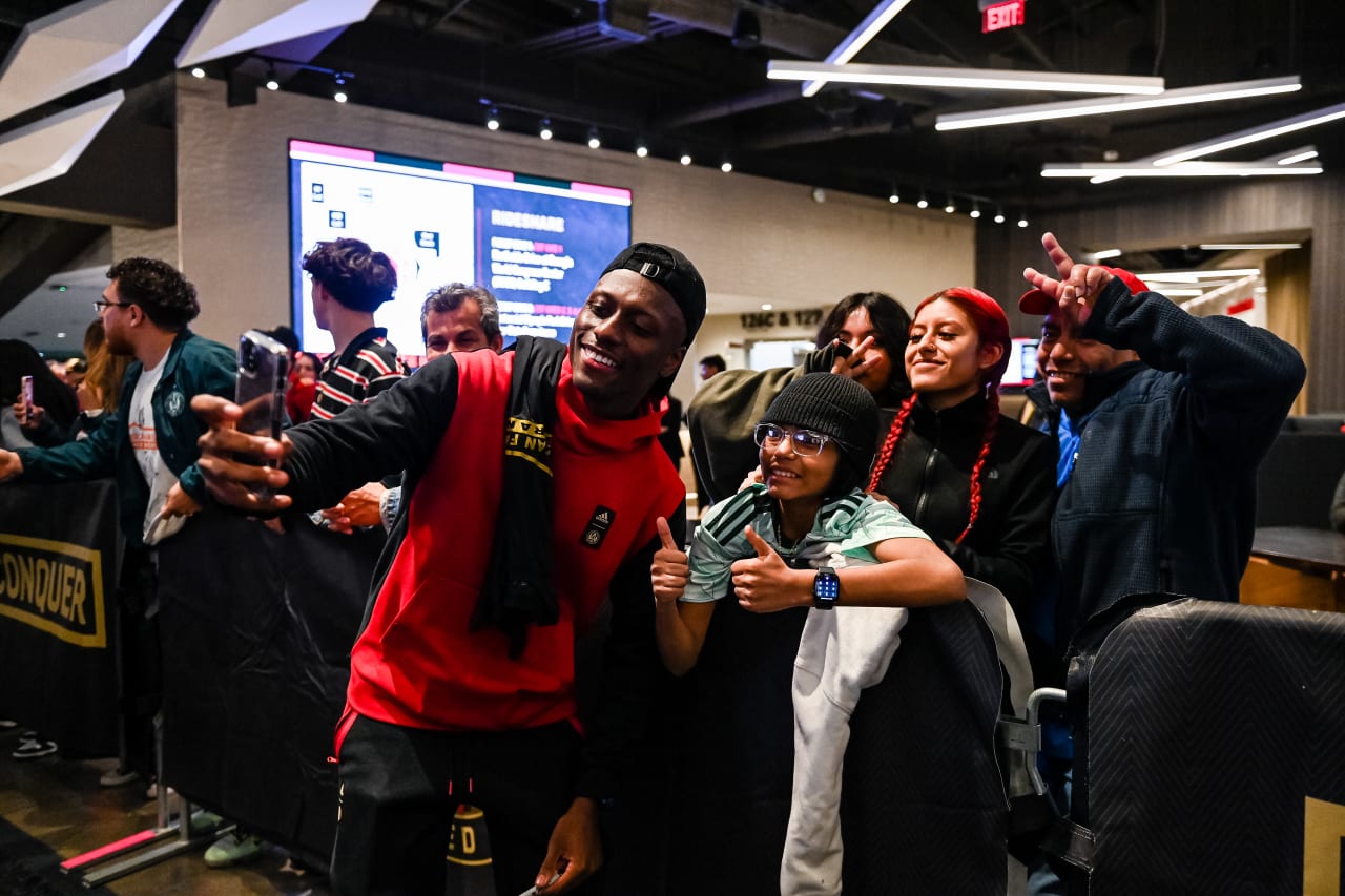 Atlanta United midfielder Derrick Etienne Jr. #18 poses for photos with fans after the preseason match against Toluca FC at Mercedes-Benz Stadium in Atlanta, GA on Wednesday February 15, 2023. (Photo by Mitchell Martin/Atlanta United)