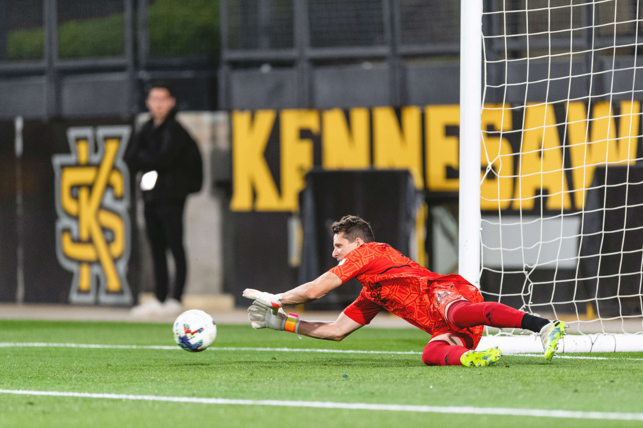 Atlanta United goalkeeper Bobby Shuttleworth makes a save during the match against Chattanooga FC at Fifth Third Bank Stadium in Kennesaw, United States on Wednesday April 20, 2022. (Photo by Kyle Hess/Atlanta United)