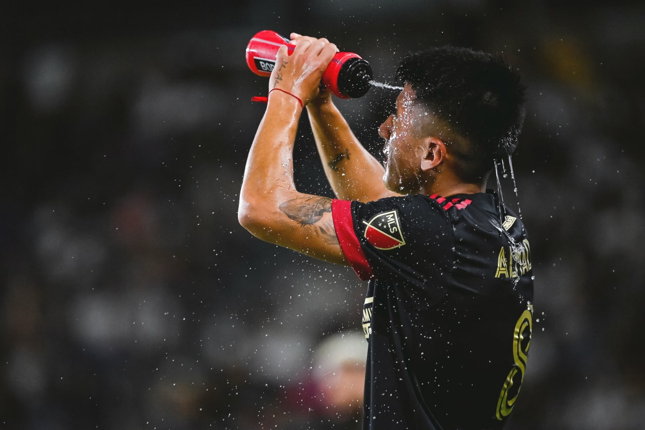 Atlanta United midfielder Thiago Almada #8 sprays himself with water during the second half of the match against LA Galaxy at Dignity Health Sports Park in Carson, United States on Sunday July 24, 2022. (Photo by Dakota Williams/Atlanta United)