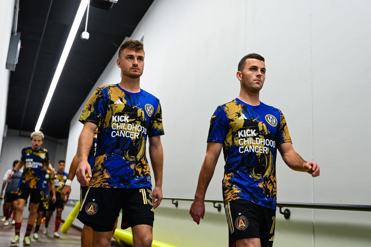 Atlanta United midfielder Amar Sejdic #13 and defender Brooks Lennon #11 walk to the pitch before the match against FC Dallas at Toyota Stadium in Dallas, TX on Saturday, September 2, 2023. (Photo by Mitch Martin/Atlanta United)