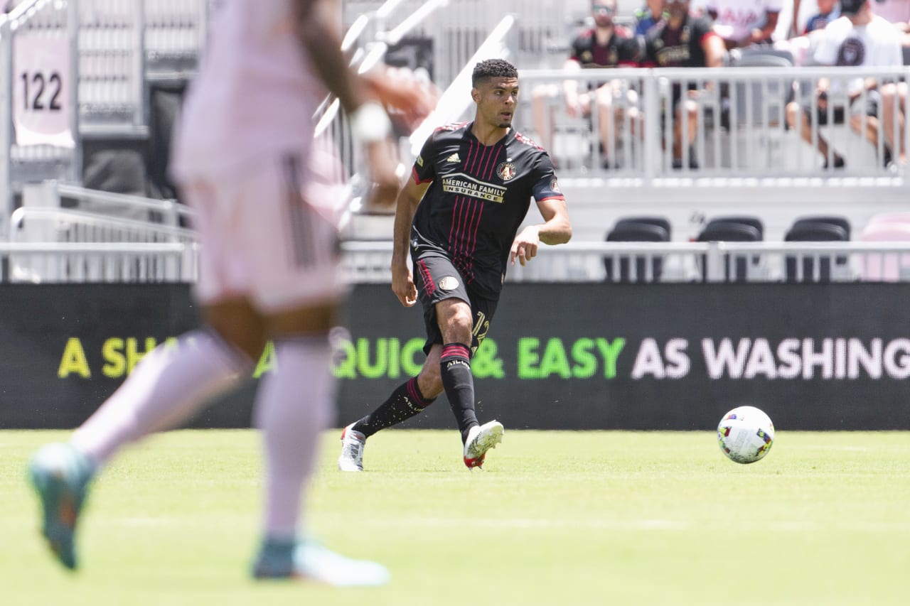 Atlanta United defender Miles Robinson #12 dribbles the ball during the match against Inter Miami at DRV PNK Stadium in Fort Lauderdale, United States on Sunday April 24, 2022. (Photo by Dakota Williams/Atlanta United