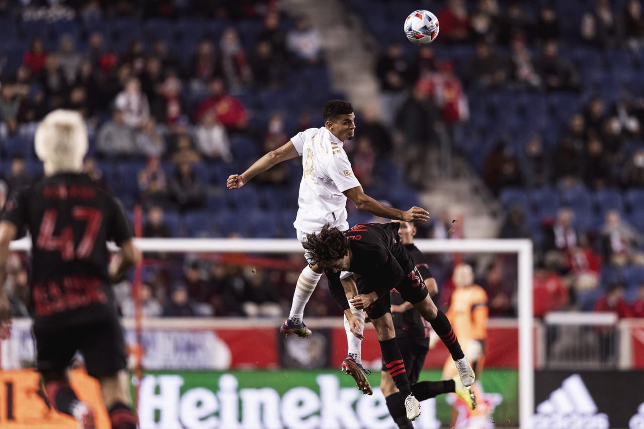 Atlanta United defender Miles Robinson #12 goes up for the ball during the match against New York Red Bulls at Red Bull Arena in Harrison, New Jersey on Wednesday November 3, 2021. (Photo by Jacob Gonzalez/Atlanta United)