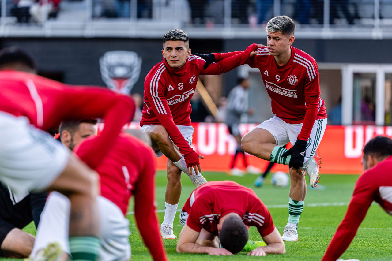 Atlanta United midfielder Thiago Almada #8 and midfielder Matheus Rossetto #9 stretch together before the match against DC United at Audi Field in Washington, DC, on Saturday April 2, 2022. (Photo by Mitch Martin/Atlanta United)