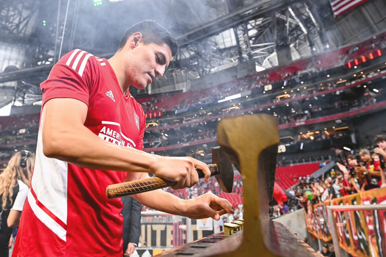 Atlanta United forward Ronaldo Cisneros #29 hammers the golden spike after defeating Seattle Sounders FC at Mercedes-Benz Stadium in Atlanta, United States on Saturday August 6, 2022. (Photo by Jay Bendlin/Atlanta United)