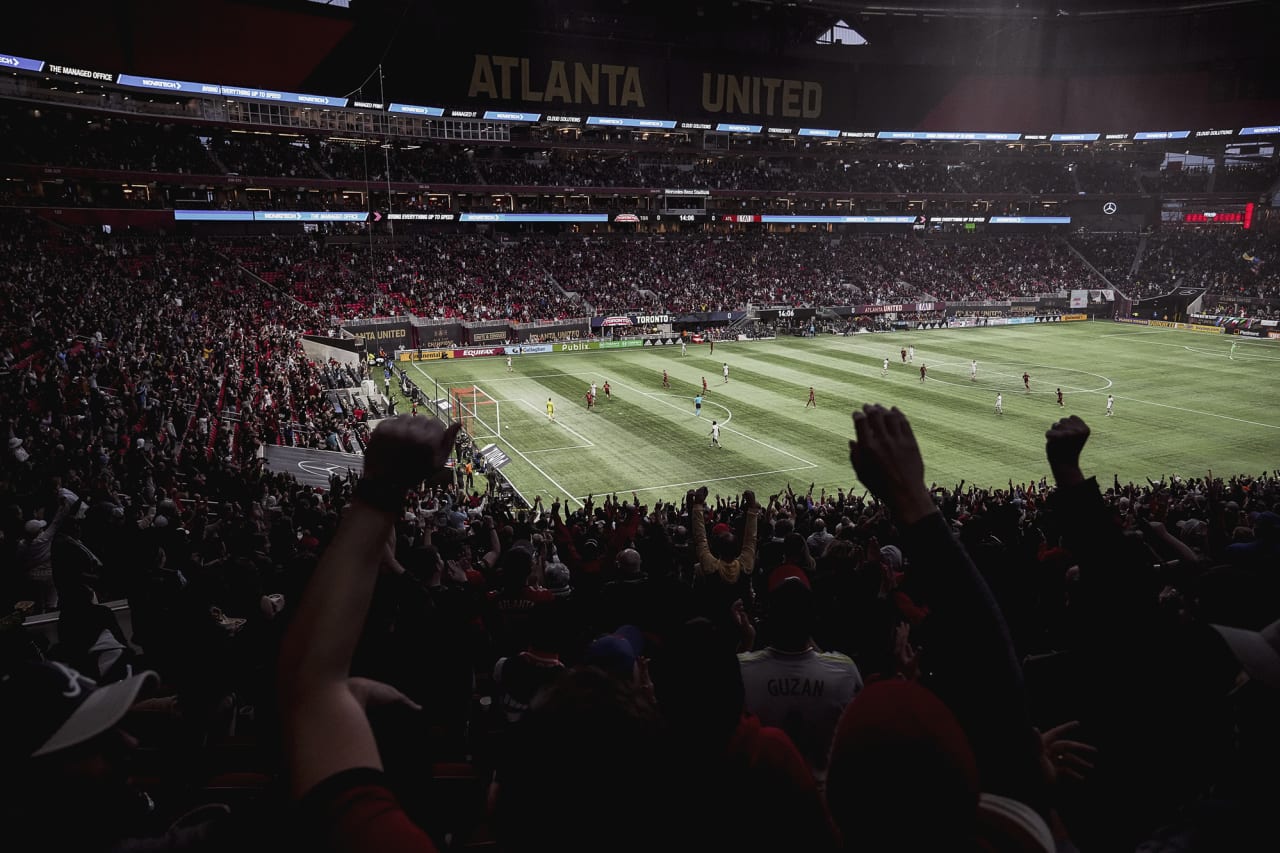 Atlanta United supporters cheer during the match against Toronto FC at Mercedes-Benz Stadium in Atlanta, Georgia on Saturday October 30, 2021. (Photo by Mark Brown/Atlanta United)