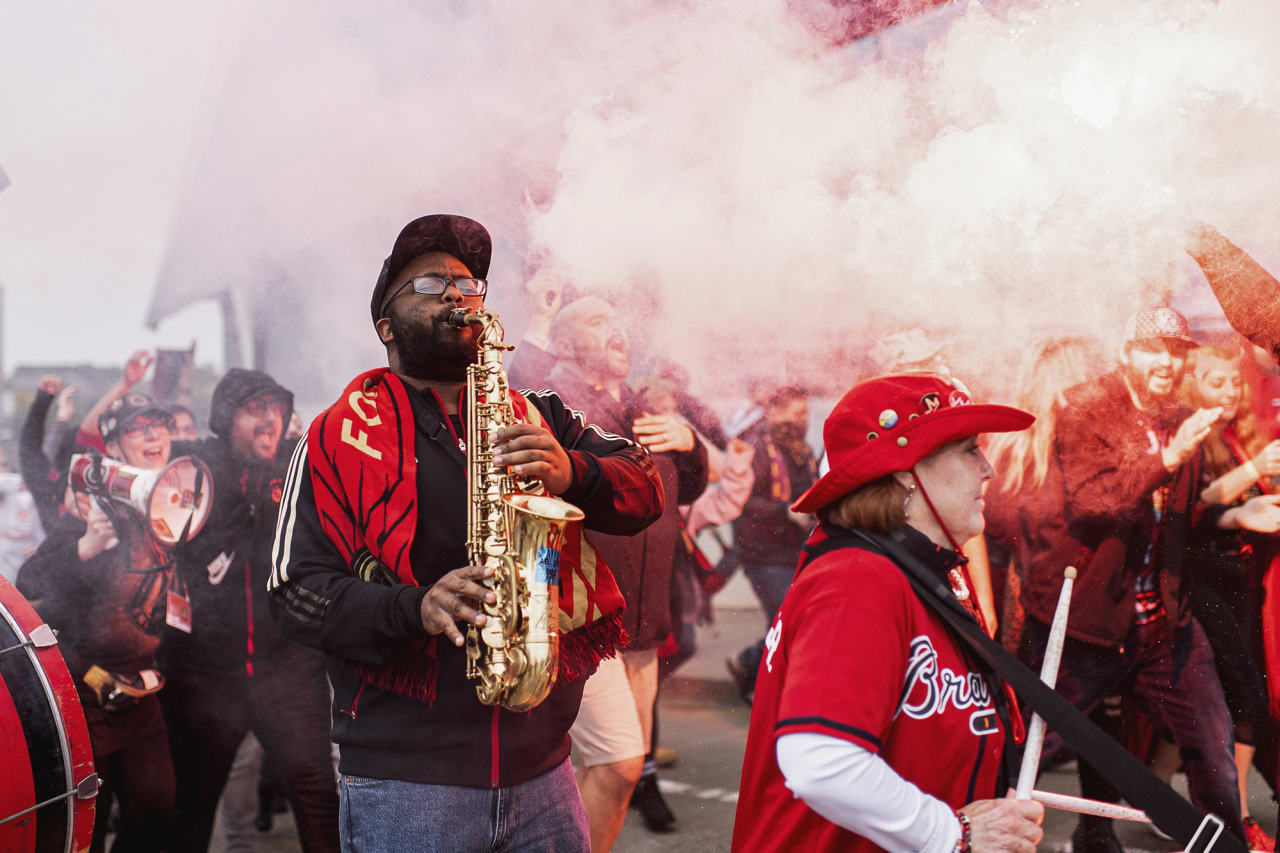 Atlanta United supporters march towards the stadium before the match against Toronto FC at Mercedes-Benz Stadium in Atlanta, Georgia on Saturday October 30, 2021. (Photo by Mitchell Martin/Atlanta United)
