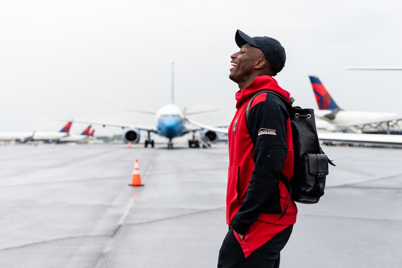 Atlanta United midfielder Derrick Etienne Jr. #18 walks to get on the plane at Hartsfield-Jackson International Airport in Atlanta, Ga., on Friday, May 5, 2023. (Photo by Mitch Martin/Atlanta United)