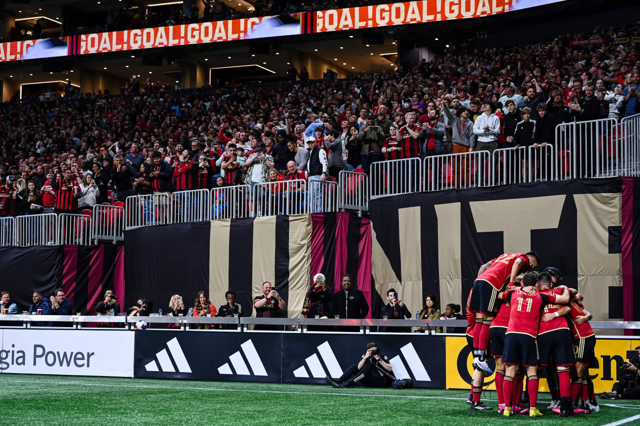 Atlanta United defender Caleb Wiley #26 celebrates with teammates after a goal during the first half of the match against Portland Timbers at Mercedes-Benz Stadium in Atlanta, GA on Saturday March 18, 2023. (Photo by Brandon Magnus/Atlanta United)