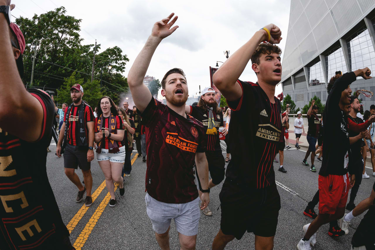 Supporters march towards the stadium before the match against New York Red Bulls at Mercedes-Benz Stadium in Atlanta, Georgia, on Wednesday August 17, 2022. (Photo by Jay Bendlin/Atlanta United)