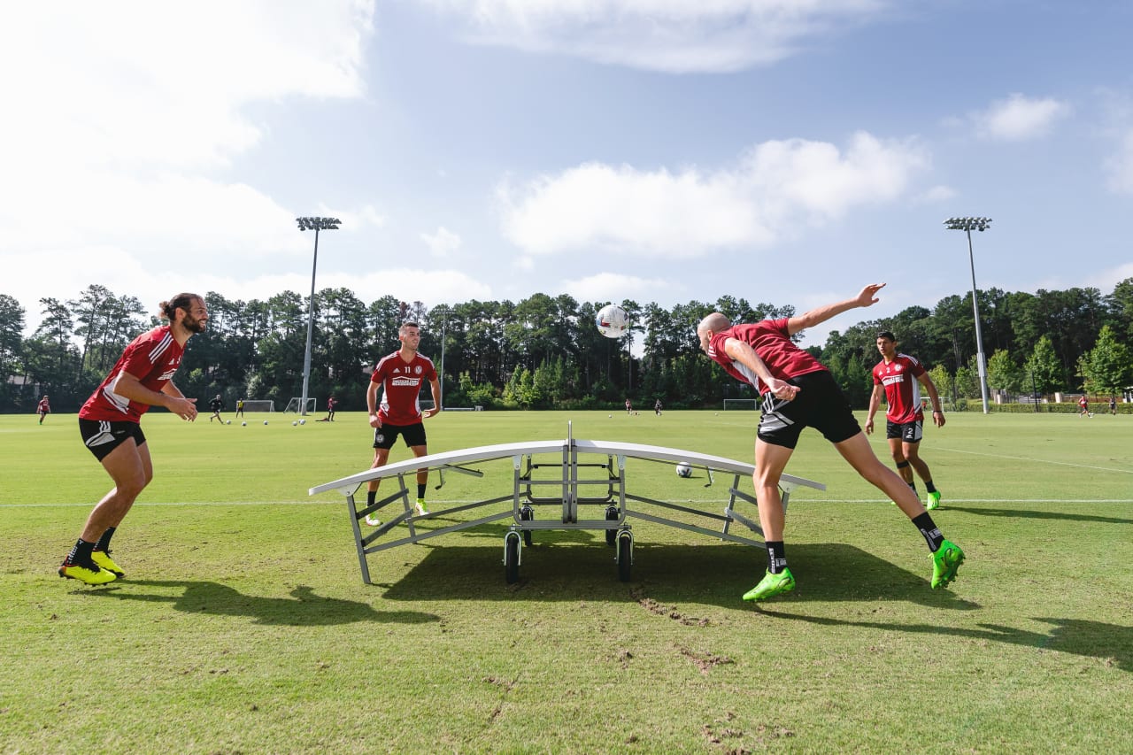 Atlanta United defender Andrew Gutman #15 heads the ball during a game of table soccer tennis after training at Children's Healthcare of Atlanta Training Ground in Marietta, Georgia, on Thursday August 4, 2022. (Photo by Dakota Williams/Atlanta United)