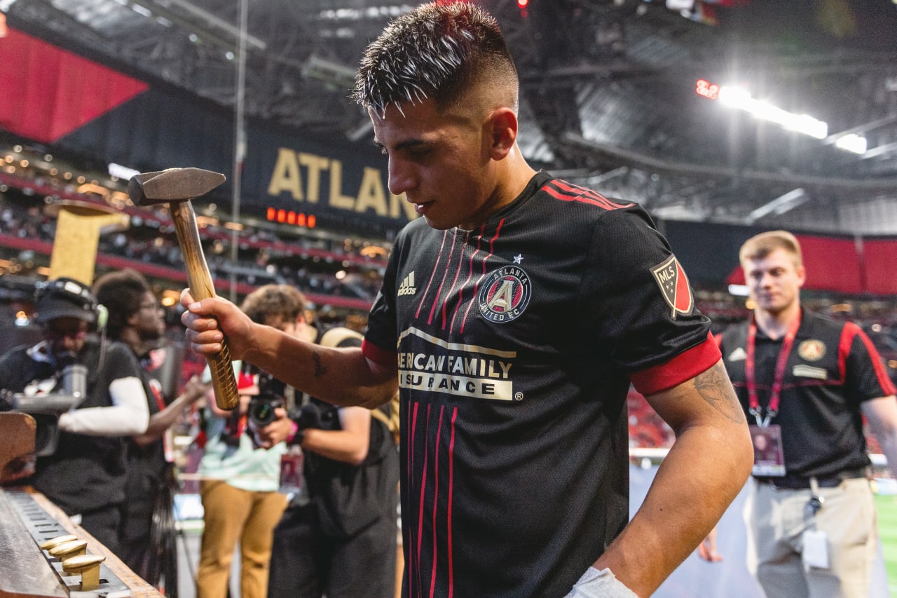 Atlanta United midfielder Thiago Almada #8 hits the golden spike of excellence after the match against CF Montreal at Mercedes-Benz Stadium in Atlanta, United States on Saturday March 19, 2022. (Photo by Mitchell Martin/Atlanta United)