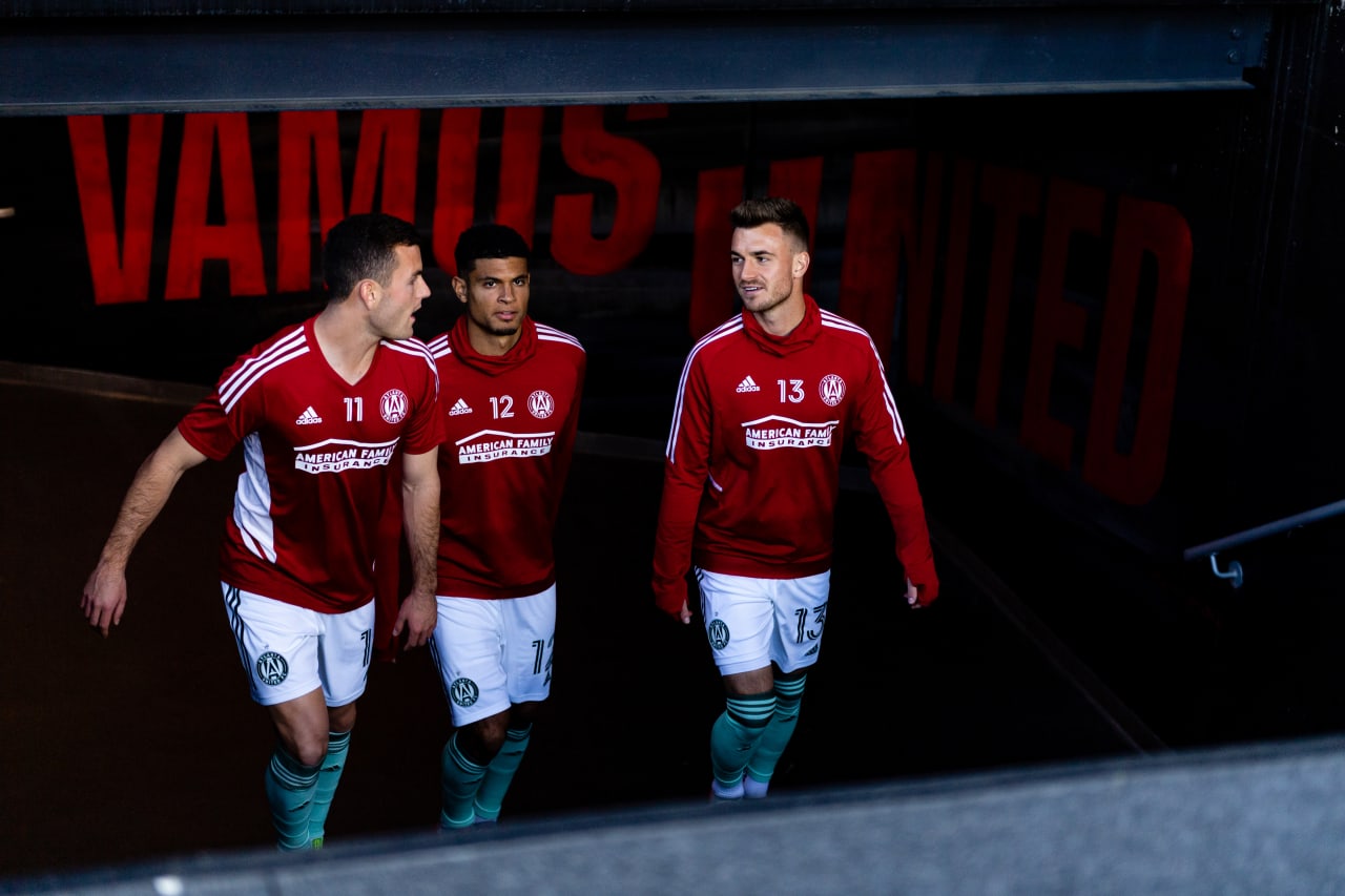 Atlanta United defender Brooks Lennon #11, defender Miles Robinson #12, and midfielder Amar Sejdic #13 walk out to the field for warm ups before the match against DC United at Audi Field in Washington, DC, on Saturday April 2, 2022. (Photo by Mitch Martin/Atlanta United)
