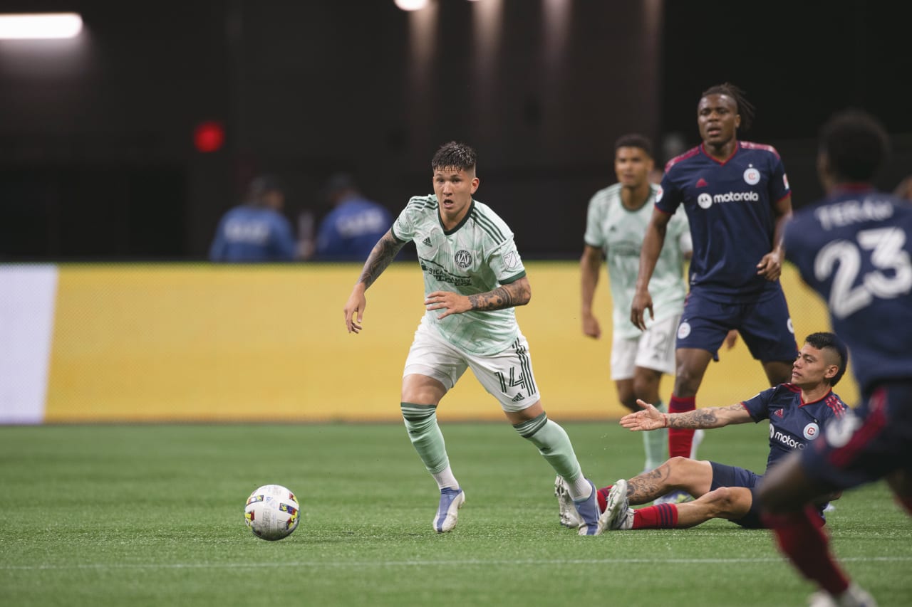 Atlanta United midfielder Franco Ibarra #14 dribbles the ball during the match against Chicago Fire FC at Mercedes-Benz Stadium in Atlanta, United States on Saturday May 7, 2022. (Photo by Kyle Hess/Atlanta United)