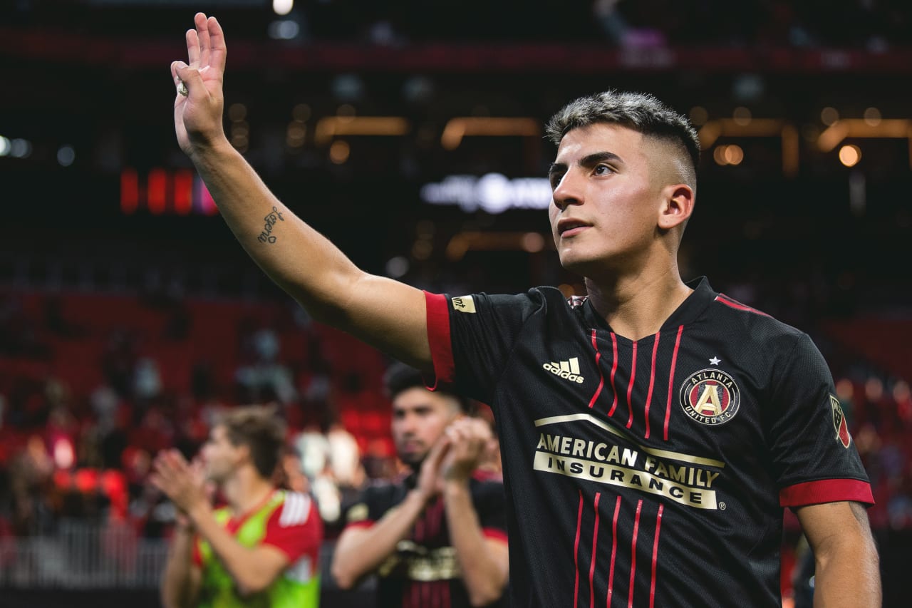 Atlanta United midfielder Thiago Almada #8 interacts with supporters after the 2022 Opening Day match against Charlotte FC at Mercedes-Benz Stadium in Atlanta, United States on Sunday March 13, 2022. (Photo by Dakota Williams/Atlanta United)
