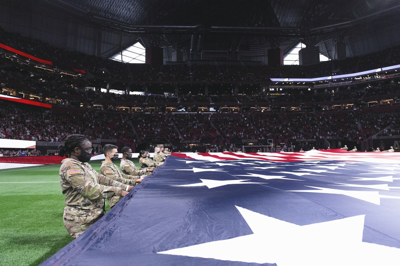 The American Flag is seen during the National Anthem before the 2022 Opening Day match against Sporting Kansas City at Mercedes-Benz Stadium in Atlanta, United States on Sunday February 27, 2022. (Photo by Brandon Magnus/Atlanta United)