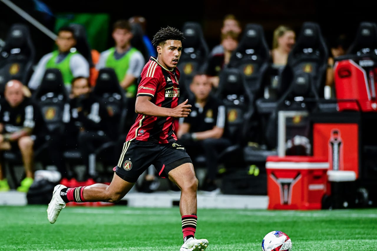 Atlanta United defender Caleb Wiley #26 dribbles during the second half during the match against New York Red Bulls at Mercedes-Benz Stadium in Atlanta, GA on Saturday April 1, 2023. (Photo by Kyle Hess/Atlanta United)