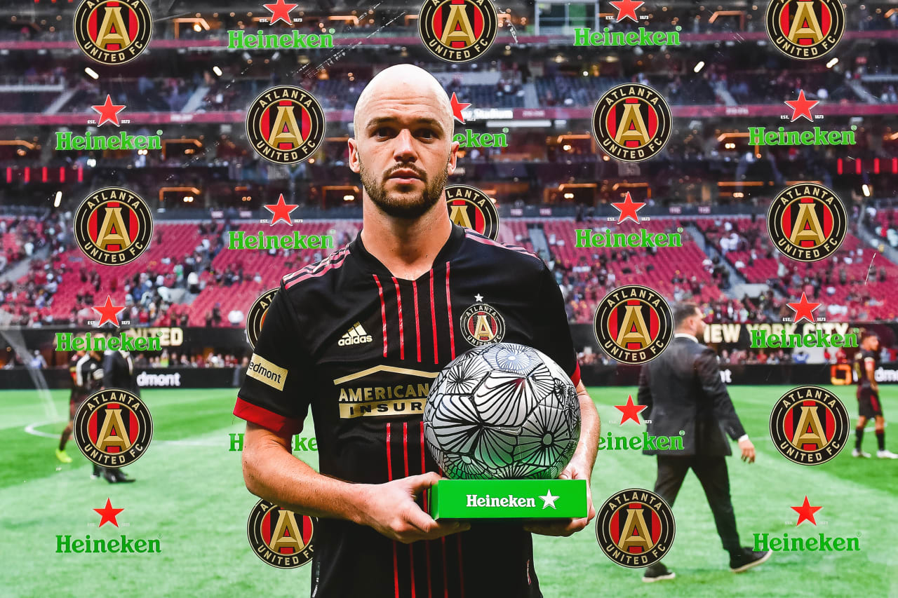 Atlanta United defender Andrew Gutman #15 receives the Heineken Man of the Match trophy after the match against New York City FC at Mercedes-Benz Stadium in Atlanta, GA on Sunday October 9, 2022. (Photo by Kyle Hess/Atlanta United)